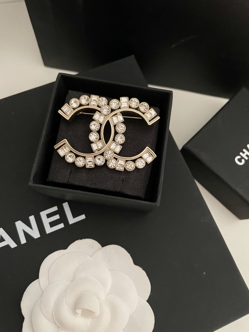 Ch**el brooches